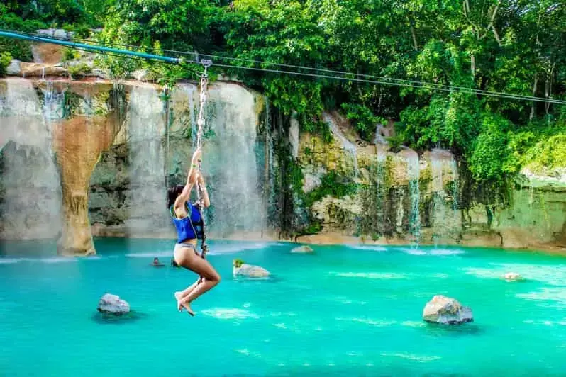 Zip-lining over the cenotes at Scape Park, Cap Cana
